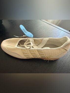 adidas Women’s Cream Knit Lace-Up Sneaker with Gold Stripes